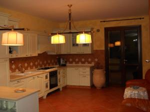 Köök või kööginurk majutusasutuses Oasi Verde