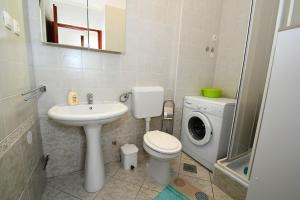 Koupelna v ubytování Studio apartman Kris