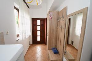 Postel nebo postele na pokoji v ubytování Studio apartman Kris