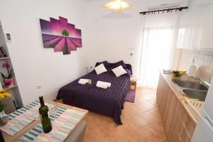Postel nebo postele na pokoji v ubytování Studio apartman Kris