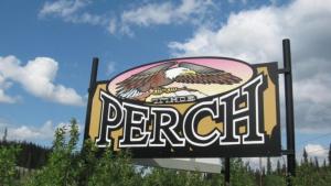a large sign with an eagle on it at The Perch Resort in McKinley Park