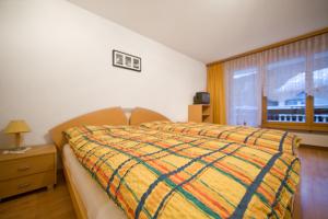 Postel nebo postele na pokoji v ubytování Haus Perelia C