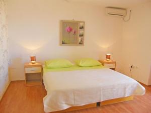 Кровать или кровати в номере Apartments Rina