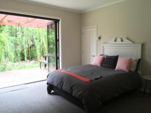 Ένα ή περισσότερα κρεβάτια σε δωμάτιο στο Lye Bow Lake House