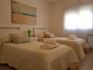 Postel nebo postele na pokoji v ubytování Buona Vista Apartamento