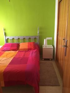 Postel nebo postele na pokoji v ubytování Estoril + 26 fotografií