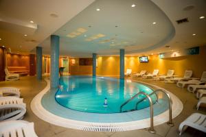 Bazén v ubytování Hotel Colosseo & Spa nebo v jeho okolí