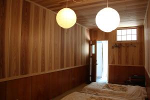En eller flere senger på et rom på Ikkyu For Backpackers 19