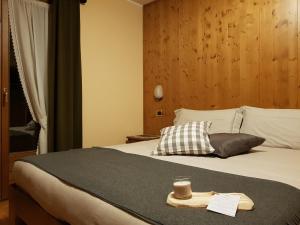 Llit o llits en una habitació de Hotel Cima Piazzi