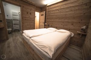 Postel nebo postele na pokoji v ubytování B & B Le Riue