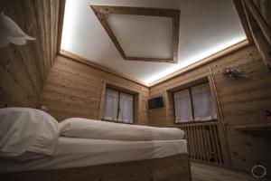 Postel nebo postele na pokoji v ubytování B & B Le Riue