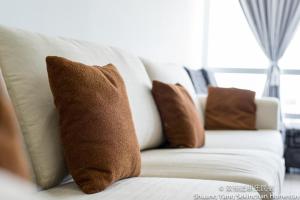 Posezení v ubytování Shuang Yang Sekinchan Homestay