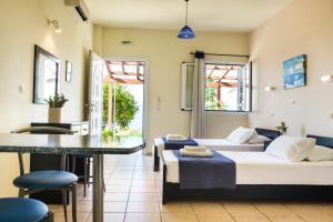 Χώρος καθιστικού στο Maria's Garden Apartments