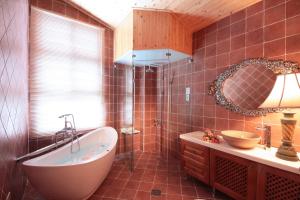 Kylpyhuone majoituspaikassa Luxembourg Hills Homestay