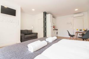 Et tv og/eller underholdning på Premium Historic Center & Parking