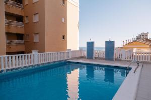 Bazén v ubytovaní Apartment Luz del Sol alebo v jeho blízkosti