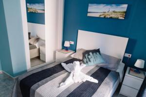 Posteľ alebo postele v izbe v ubytovaní Apartment Luz del Sol