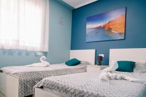 Posteľ alebo postele v izbe v ubytovaní Apartment Luz del Sol