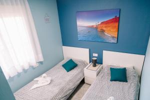 Posteľ alebo postele v izbe v ubytovaní Apartment Luz del Sol