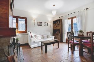 Posezení v ubytování LA GINESTA 1, Apartaments de munyanya