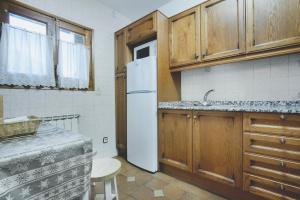 Kuchyň nebo kuchyňský kout v ubytování LA GINESTA 1, Apartaments de munyanya