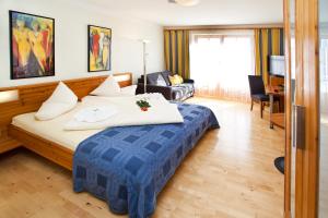 Postel nebo postele na pokoji v ubytování Hotel Binggl