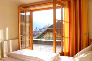 Postel nebo postele na pokoji v ubytování Hotel Binggl + 37 fotografií