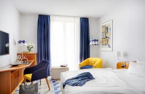 Postel nebo postele na pokoji v ubytování Seaside Park Hotel Leipzig