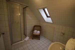Ein Badezimmer in der Unterkunft Hotel-Gaststätte Mutter Buermann