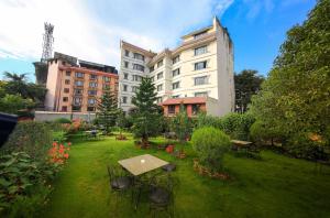 Κήπος έξω από το Samsara Boutique Hotel