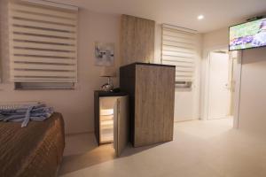 TV o dispositivi per l'intrattenimento presso Apartmani Brocat