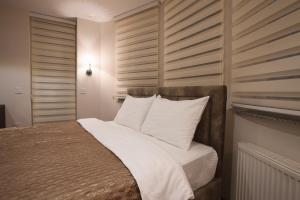 Letto o letti in una camera di Apartmani Brocat