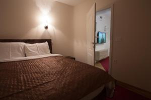 Letto o letti in una camera di Apartmani Brocat