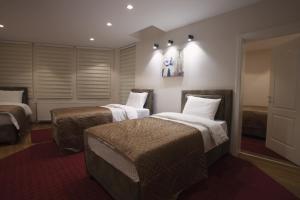 Letto o letti in una camera di Apartmani Brocat