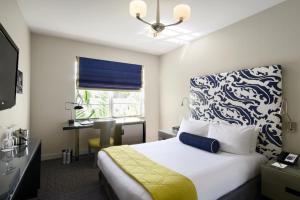 Voodi või voodid majutusasutuse Hotel Breakwater South Beach toas