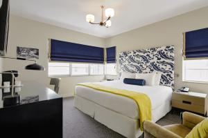 Voodi või voodid majutusasutuse Hotel Breakwater South Beach toas