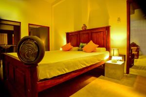 Ένα ή περισσότερα κρεβάτια σε δωμάτιο στο Canaya Boutique Villa