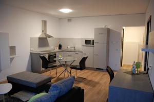 Kuchyň nebo kuchyňský kout v ubytování Boardinghouse-Niedernberg