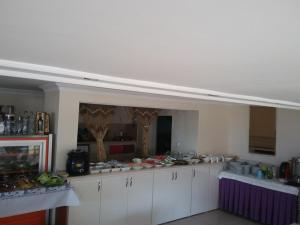 Køkken eller tekøkken på Zeus Hotel