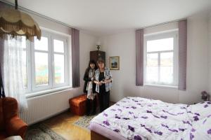 Posteľ alebo postele v izbe v ubytovaní Pension Ingrid