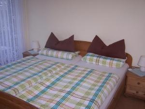Posteľ alebo postele v izbe v ubytovaní Hotel Panoramacafé Kattenes
