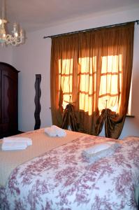 Postel nebo postele na pokoji v ubytování Agriturismo La Spiga