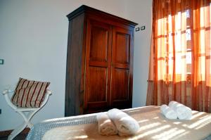 Postel nebo postele na pokoji v ubytování Agriturismo La Spiga