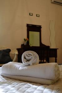 Postel nebo postele na pokoji v ubytování Agriturismo La Spiga