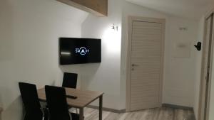 TV a/nebo společenská místnost v ubytování Villa Elisa