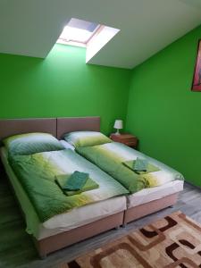 Posteľ alebo postele v izbe v ubytovaní Ubytovanie House