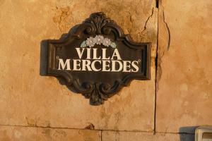 a sign on the side of a building at Villamercedes 1 in Salamanca