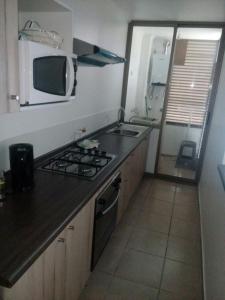 Η κουζίνα ή μικρή κουζίνα στο Departamento El Brillador