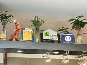 Certificato, attestato, insegna o altro documento esposto da Great Nature Villa