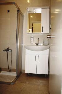 Koupelna v ubytování Reis Maris Hotel